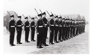M195 Parade at RAF Norton. Men at attention. 