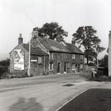 M220 Cottages opposite the Cross Scythes at the junction of Derbyshire