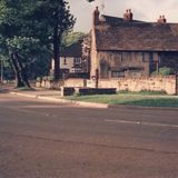 M221 The front of old cottages in Greenhill Main Road, over the road f