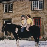 M49 Philip Wetherill riding with Louise Hanwell on her pony, Solomon, 