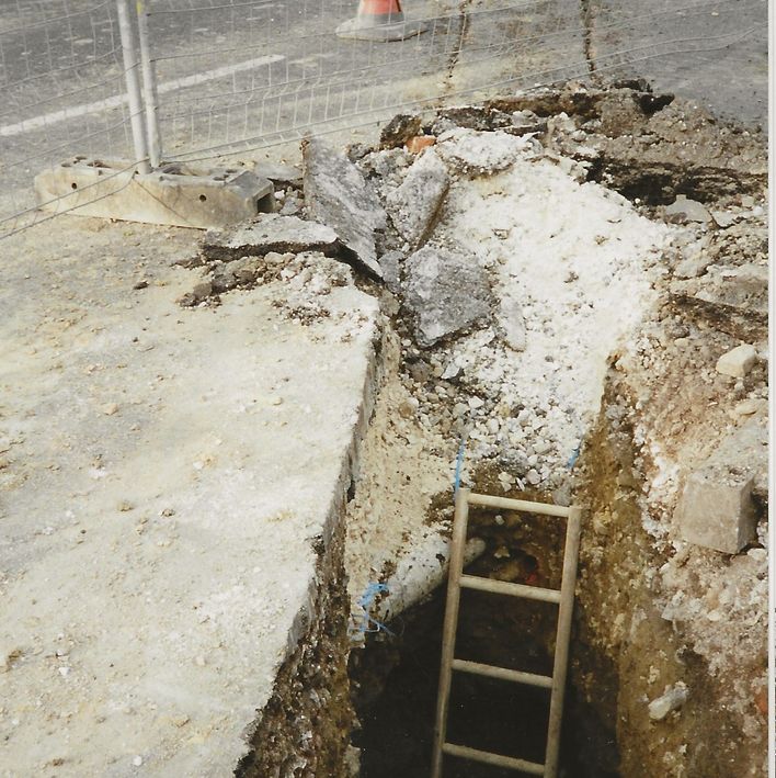 SG152 Hole in Norton Lane showing depth of sewer beneath roadway. Apri