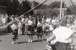 s126 Pageant, 1983.  Maypole dancing on green by Church