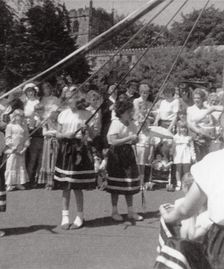 s126 Pageant, 1983.  Maypole dancing on green by Church