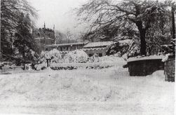 s158 Norton Church in Feb 1947 snowfall.  Shows Rectory wall